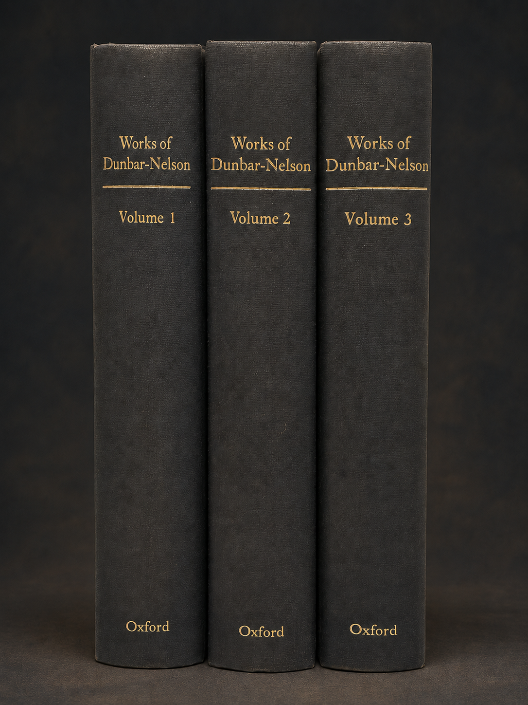 Complete three-volume set of The Works of Alice Dunbar-Nelson, Oxford University Press, shown upright with gold-lettered spines.