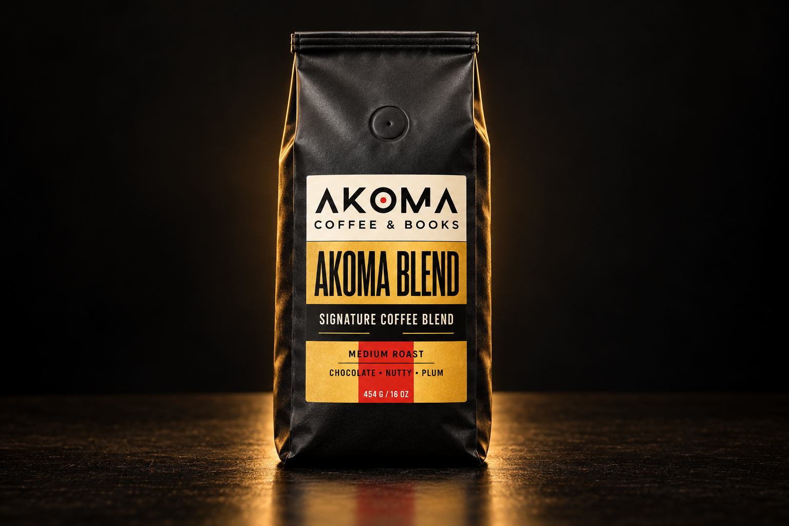 Akoma Signature Blend coffee bag on a black background
